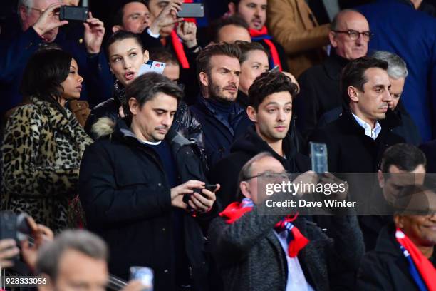 Top model Bella Hadid, former Real Madrid and PSG player David Beckham and former Manchester United player Gary Neville during the UEFA Champions...