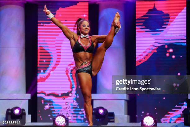 Becca Sizemore competes in Fitness International as part of the Arnold Sports Festival on March 2 at the Greater Columbus Convention Center in...