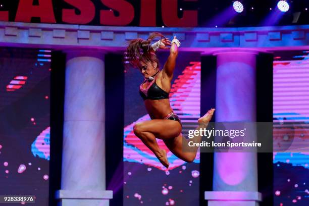 Becca Sizemore competes in Fitness International as part of the Arnold Sports Festival on March 2 at the Greater Columbus Convention Center in...