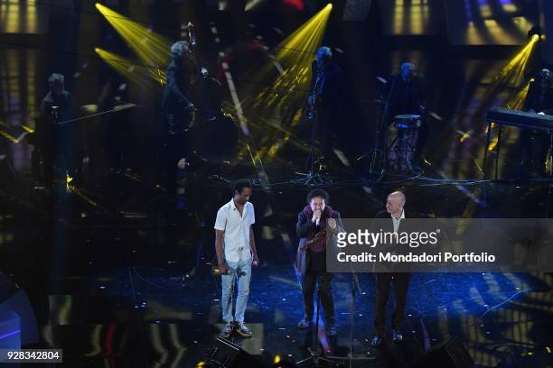 Italian singers Enzo Avitabile e Peppe Servillo duet with Avion Travel and Daby Touré on the Ariston stage during the 68th Festival di Sanremo....