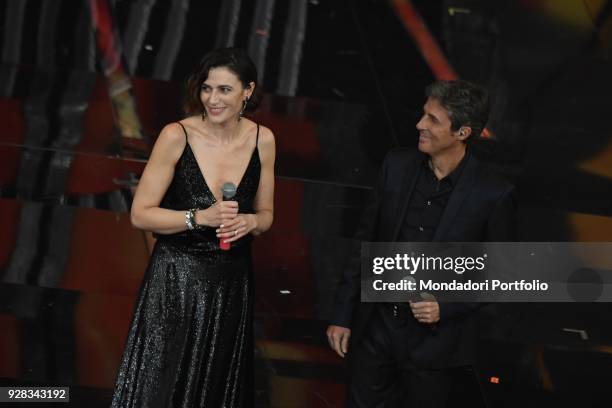 Italian singer Luca Barbarossa and Anna Foglietta performs on the Ariston stage during the 68th Festival di Sanremo. Sanremo, February 9th 2018