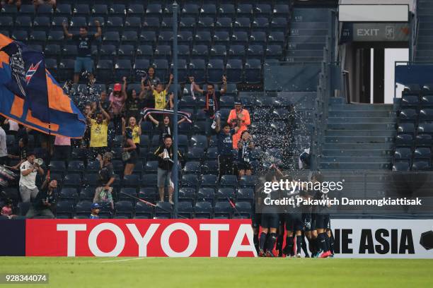 Buriram United players celebrate after scoring goal during the AFC Champions League Group G match between Buriram United Football Club and Cerezo...