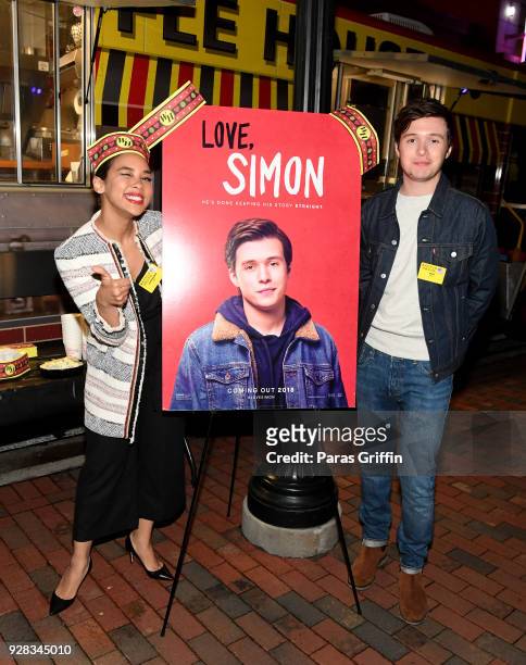 Actress Alexandra Shipp and actor Nick Robinson attend "Love, Simon" Atlanta Fan Screening and Q&A at the Waffle House Food Truck at Regal Atlantic...