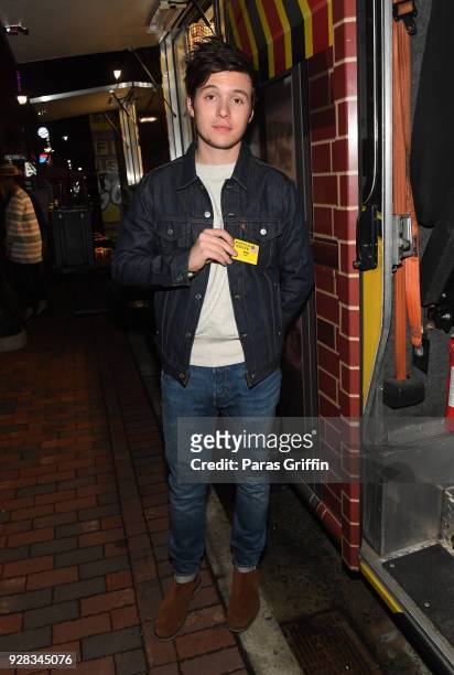 Actor Nick Robinson attends "Love, Simon" Atlanta Fan Screening and Q&A at the Waffle House Food Truck at Regal Atlantic Station on March 6, 2018 in...