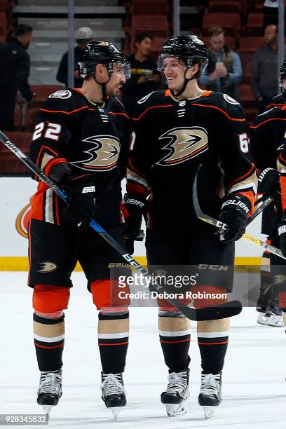 Chris Kelly and Rickard Rakell of the Anaheim Ducks smile following their 4-0 win over the Washington Capitals on March 6, 2018 at Honda Center in...