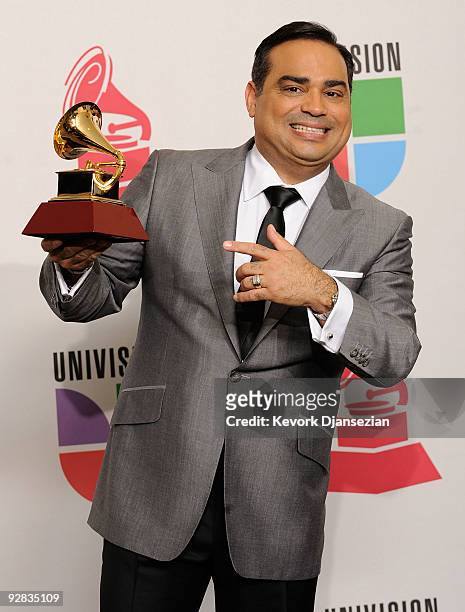 Gilberto Santa Rosa, Gramy winner for Traditional Tropical Album poses in the press room during the 10th annual Latin GRAMMY Awards held at Mandalay...