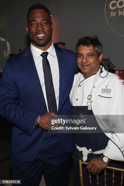 Justin Tuck and Floyd Cardoz attend Cookies for Kids' Cancer Fifth Annual Chefs Benefit at Metropolitan West on March 6, 2018 in New York City.