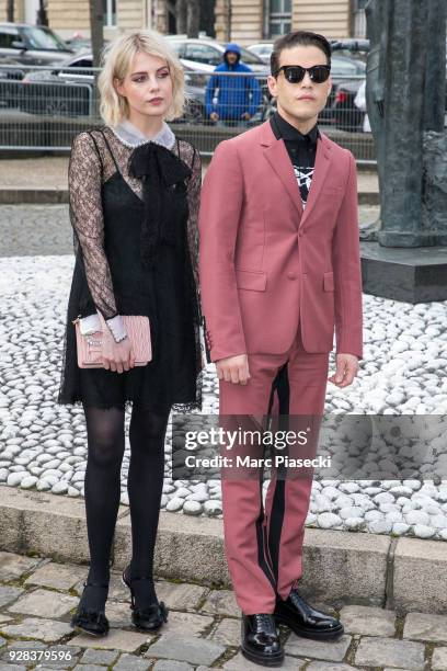 Rami Malek and Lucy Boynton attend the Miu Miu show as part of the Paris Fashion Week Womenswear Fall/Winter 2018/2019 on March 6, 2018 in Paris,...