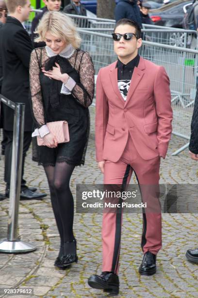 Rami Malek and Lucy Boynton attend the Miu Miu show as part of the Paris Fashion Week Womenswear Fall/Winter 2018/2019 on March 6, 2018 in Paris,...