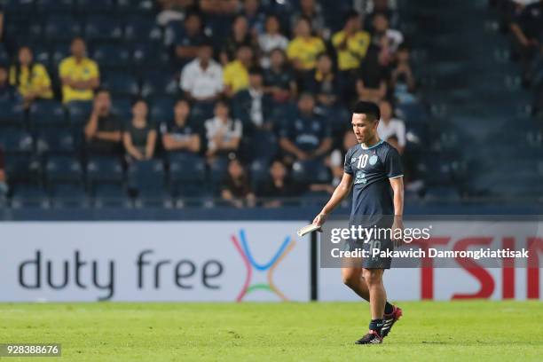 Jakkaphan Kaewprom of Buriram United FC walks out of the field after received red card during the AFC Champions League Group G match between Buriram...