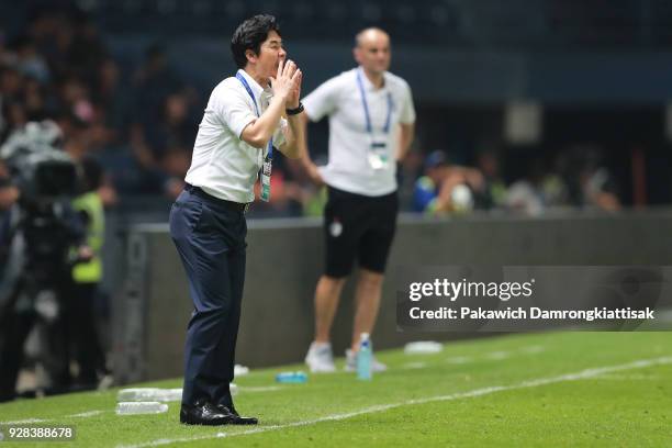 Yoon Jong Hwan, Cerezo Osaka head coach, gives instruction to Cerezo Osaka players during the AFC Champions League Group G match between Buriram...