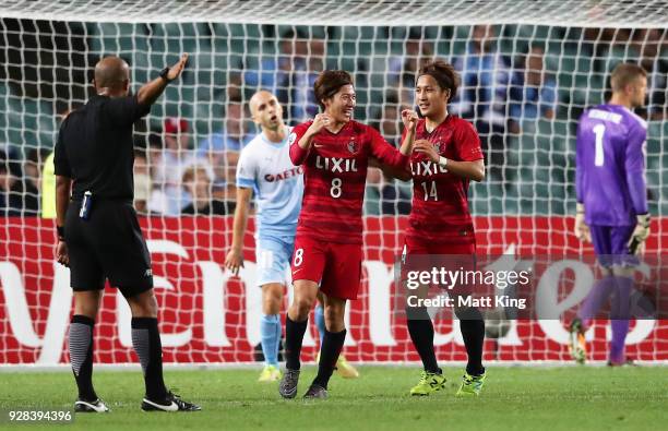 Shoma Doi of Kashima Antlers celebrates with team mates after scoring a goal during the AFC Asian Champions League match between Sydney FC and...