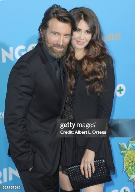 Actor Sharlto Copley and model Tanit Phoenix arrive for the Premiere Of Amazon Studios And STX Films' "Gringo" held at Regal LA Live Stadium 14 on...