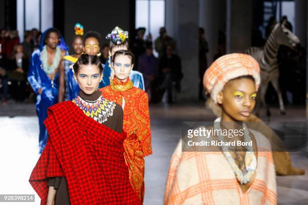 Models walk the runway during the Junko Shimada show as part of the Paris Fashion Week Womenswear Fall/Winter 2018/2019 on March 6, 2018 in Paris,...