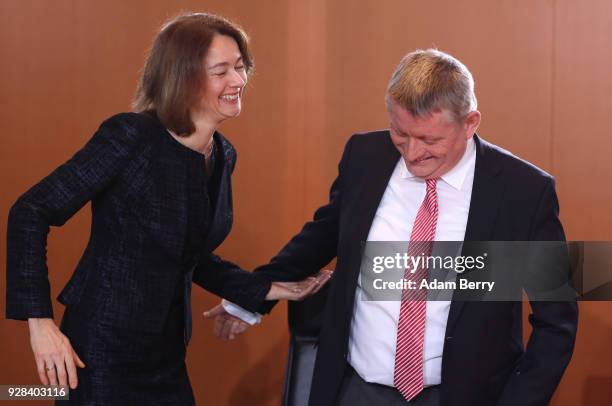 Family Minister Katarina Barley and Health Minister Hermann Groehe arrive for the weekly German federal Cabinet meeting on March 7, 2018 in Berlin,...