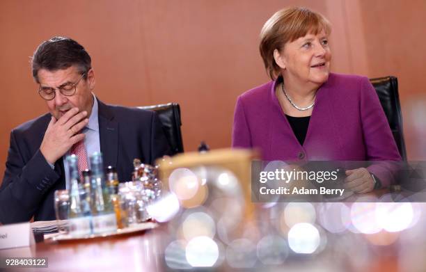 German Chancellor Angela Merkel and Vice Chancellor and Foreign Minister Sigmar Gabriel arrive for the weekly German federal Cabinet meeting on March...