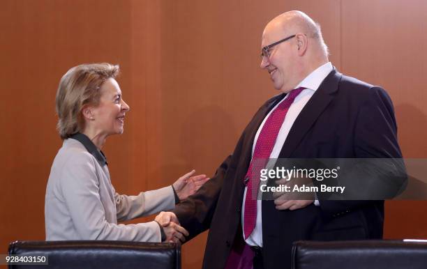 Defense Minister Ursula von der Leyen and Minister of the Chancellery Peter Altmaier arrive for the weekly German federal Cabinet meeting on March 7,...