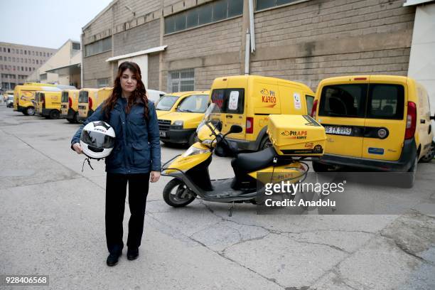 Elif Mansur works as a postwoman in Izmir, Turkey on February 26, 2018. Women took part in every part of business life in terms of firefighter,...