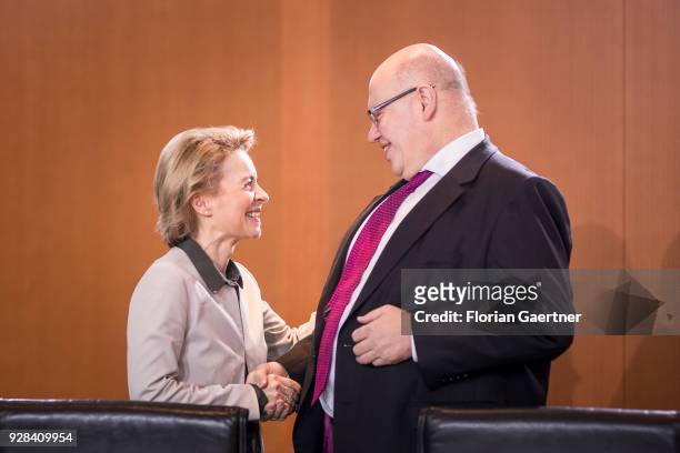 German Defense Minister Ursula von der Leyen talks with Head of the German Chancellery Peter Altmaier before the weekly interim government cabinet...
