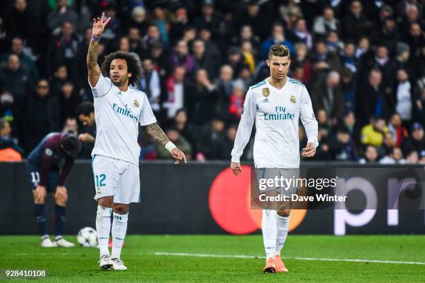 Marcelo and Cristiano Ronaldo of Real Madrid during the UEFA Champions League Round of 16 Second Leg match between Paris Saint Germain and Real...