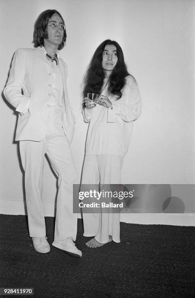 Beatles singer, songwriter and guitarist John Lennon and his wife, artist Yoko Ono, at the opening of John's 'Joke Art' exhibition, UK, 1st July...