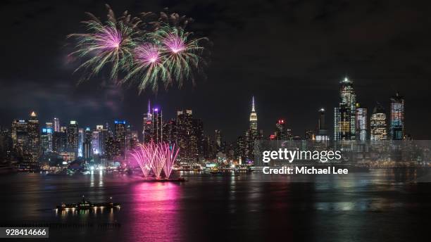 lunar new year fireworks - new york - festival in times square stock pictures, royalty-free photos & images