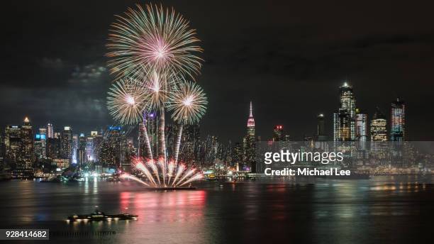 lunar new year fireworks - new york - festival in times square stock pictures, royalty-free photos & images