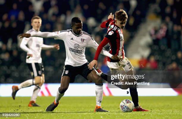 Ryan Sessegnon of Fulham and Enda Stevens of Sheffield United in action during the Sky Bet Championship match between Fulham and Sheffield United at...