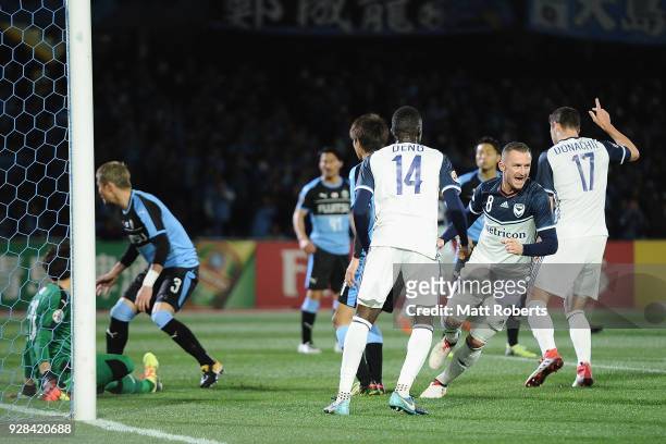 Besart Berisha of Melbourne Victory celebrates scoring a goal during the AFC Champions League Group F match between Kawasaki Frontale and Melbourne...