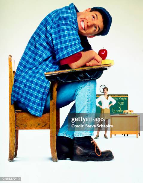 Photomontage of American actor Adam Sandler, in costume, as the title character in 'Billy Madison' and, in the background and also in costume,...