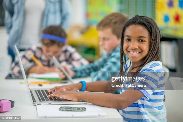girl working on a computer - code language app stock pictures, royalty-free photos & images
