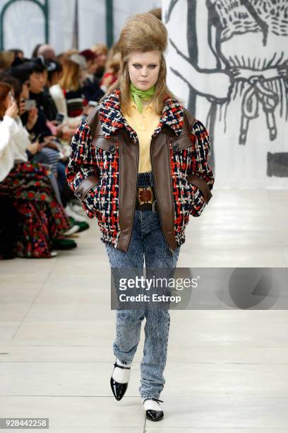 Model walks the runway during the Miu Miu show as part of the Paris Fashion Week Womenswear Fall/Winter 2018/2019 on March 6, 2018 in Paris, France.
