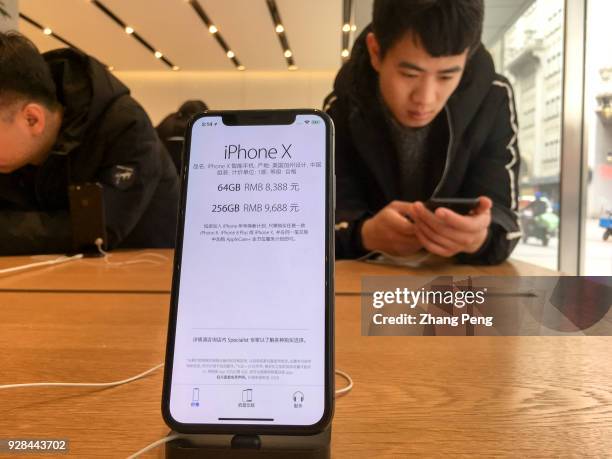 IPhone X shown in an Apple store. Though the high price of iPhone X, the sales of the new iPhone in China has surpassed the expectation. In the 29...