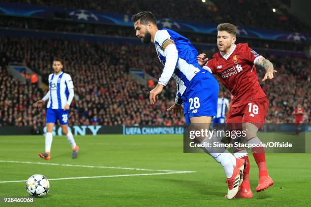 Felipe of Porto battles with Alberto Moreno of Liverpool during the UEFA Champions League Round of 16 Second Leg match between Liverpool and FC Porto...