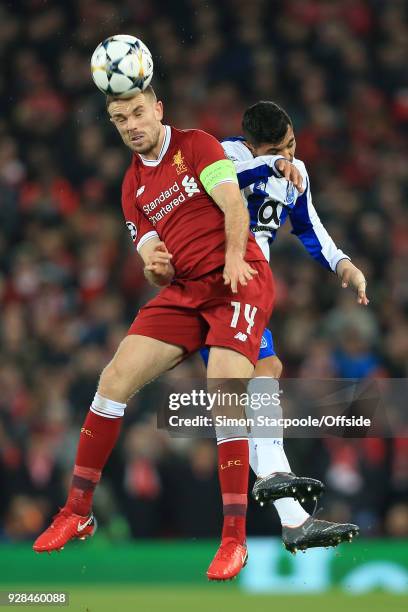 Jordan Henderson of Liverpool battles with Jesus Manuel Corona of Porto during the UEFA Champions League Round of 16 Second Leg match between...
