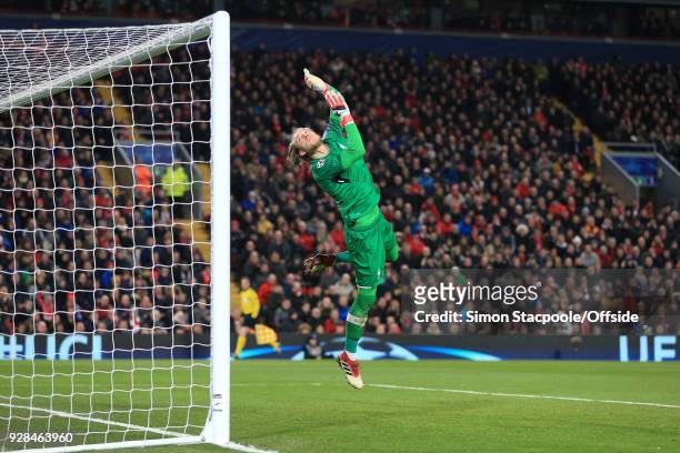 Liverpool goalkeeper Loris Karius dives as he watches the ball go over the bar during the UEFA Champions League Round of 16 Second Leg match between...