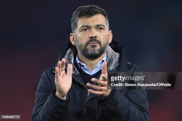 Porto coach Sergio Conceicao applauds the support after the UEFA Champions League Round of 16 Second Leg match between Liverpool and FC Porto at...
