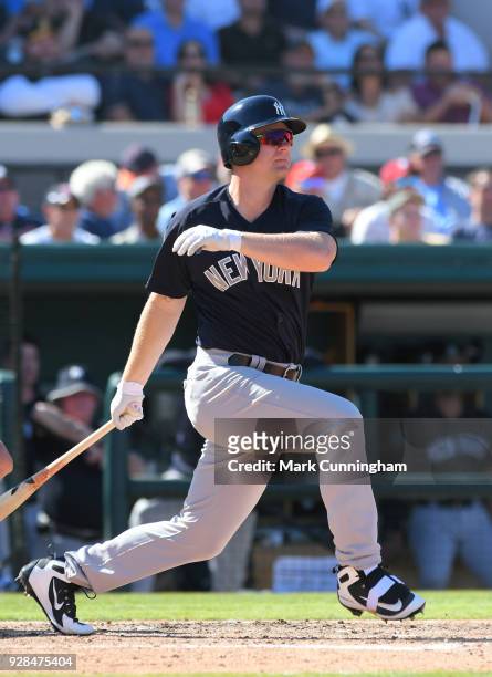 Adam Lind of the New York Yankees bats during the Spring Training game against the Detroit Tigers at Publix Field at Joker Marchant Stadium on March...