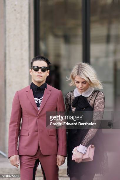 Rami Malek and Lucy Boynton are seen, outside Miu Miu, during Paris Fashion Week Womenswear Fall/Winter 2018/2019, on March 6, 2018 in Paris, France.