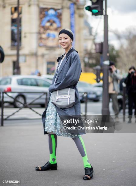 Irene Kim is seen outside Miu Miu during Paris Fashion Week Womenswear Fall/Winter 2018/2019 on March 6, 2018 in Paris, France.