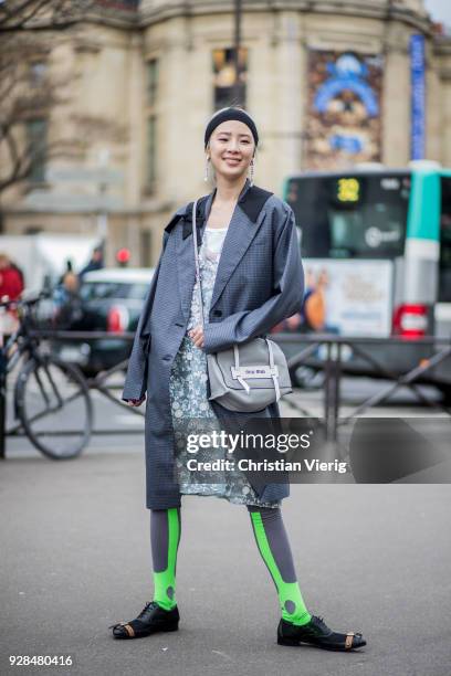 Irene Kim is seen outside Miu Miu during Paris Fashion Week Womenswear Fall/Winter 2018/2019 on March 6, 2018 in Paris, France.