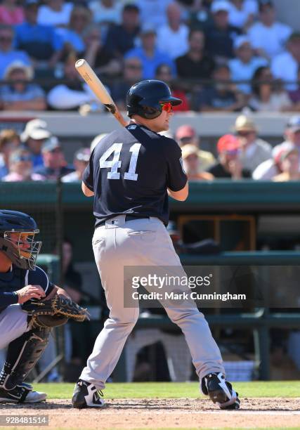 Adam Lind of the New York Yankees bats during the Spring Training game against the Detroit Tigers at Publix Field at Joker Marchant Stadium on March...