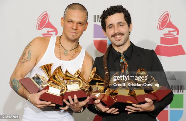 Residente and Visitante of Calle 13 poses in the press room at the 10th Annual Latin GRAMMY Awards held at the Mandalay Bay Events Center on November...