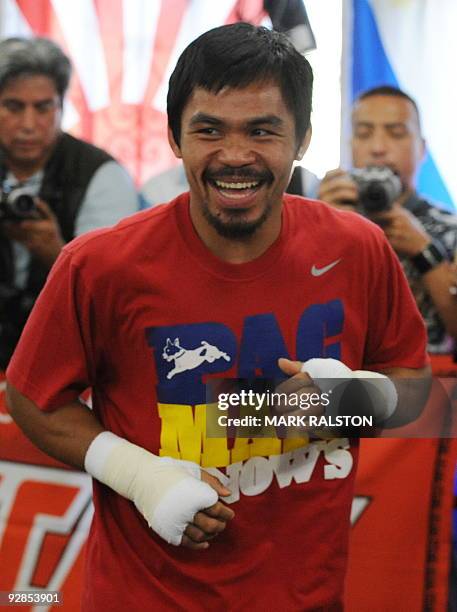 Welterweight boxing champion Manny "PacMan" Pacquiao of the Philippines, trains as he prepares for his fight against Miguel Cotto, at the Wild Card...