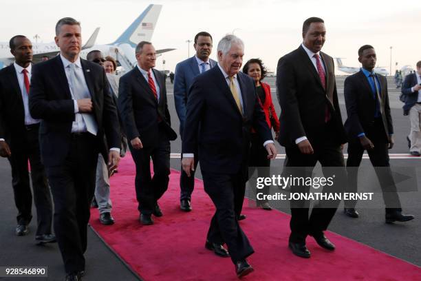 Ethiopia's Minister of Foreign Affairs Workneh Gebeyehu walks beside US Secretary of State Rex Tillerson on arrival at Addis Ababa International...