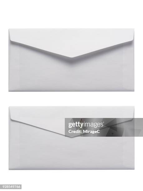 white envelope on white background - envelope stockfoto's en -beelden