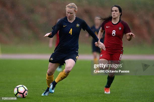 Clare Polkinghorne of Australia competes for the ball with Laura Luis of Portugal during the 3rd place playoff Women's Algarve Cup Tournament match...