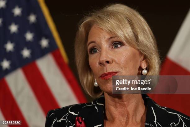 Education Secretary Betsy DeVos speaks to the news during a press conference held at the Heron Bay Marriott about her visit to Marjory Stoneman...