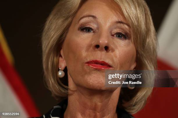 Education Secretary Betsy DeVos speaks to the news during a press conference held at the Heron Bay Marriott about her visit to Marjory Stoneman...