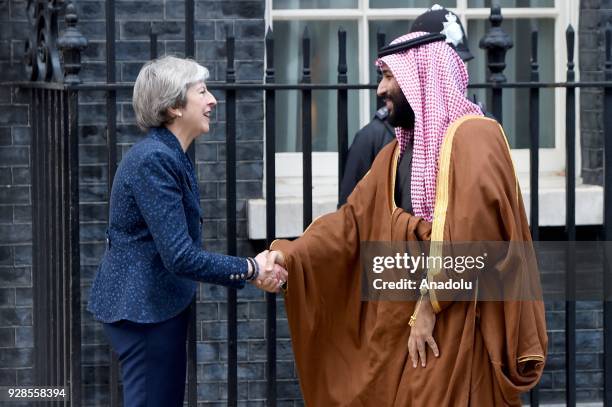 British Prime Minister Theresa May greets The Crown Prince of Saudi Arabia Mohammad bin Salman al-Saud on the steps of No.10 Downing Street, as he...